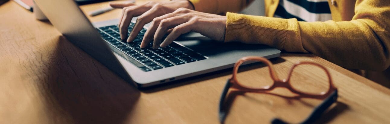 Person typing on a keyboard - to illustrate a privacy notice