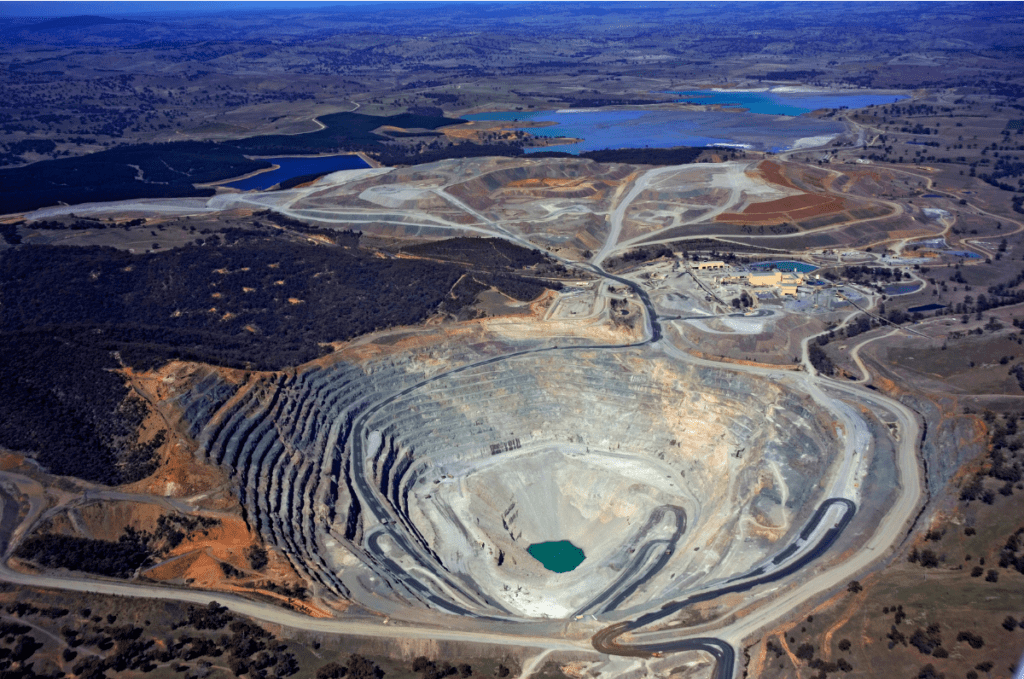 an aerial view of an open pit mine