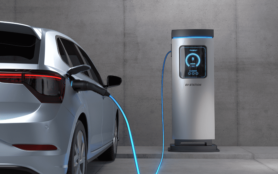 an electric car is plugged into an electric charging station